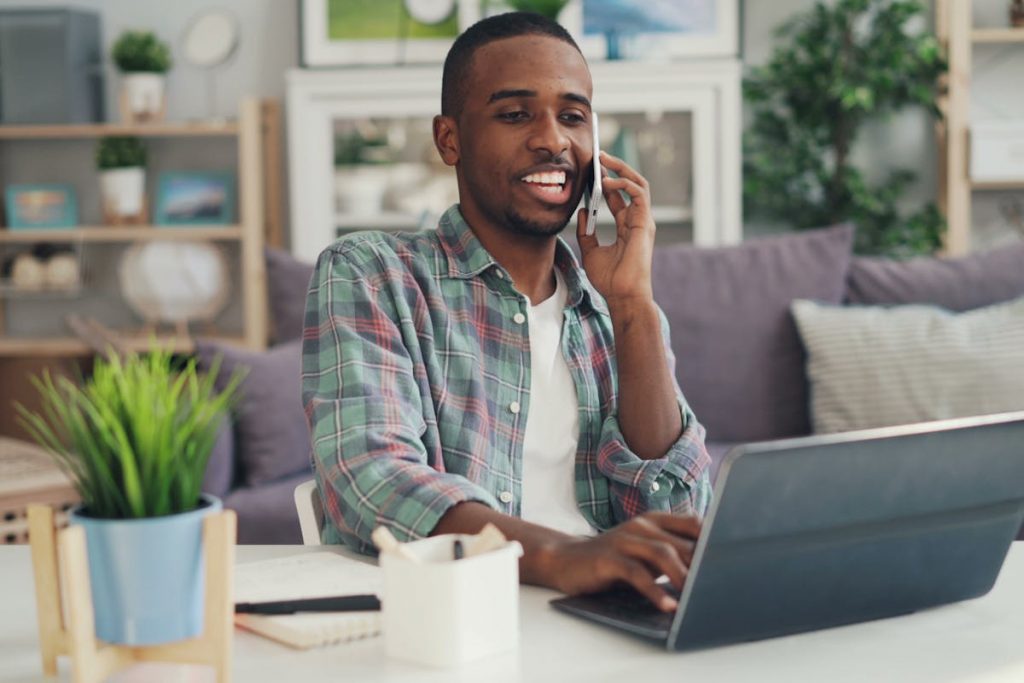 a man talking to someone on the phone